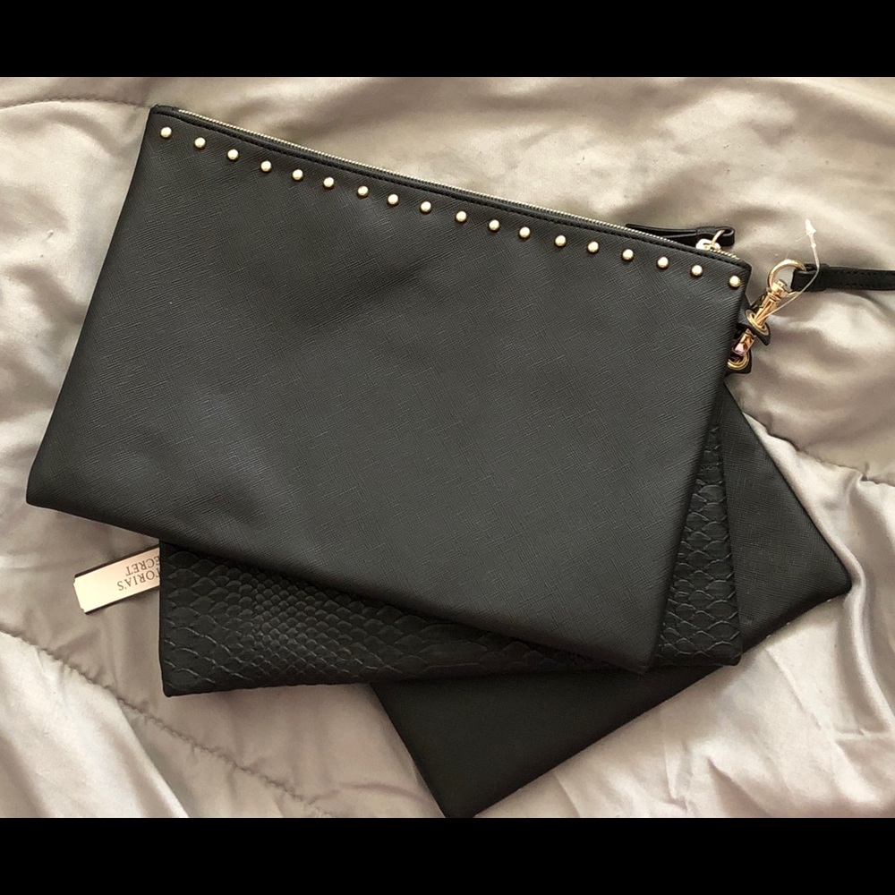 SOLD Victoria Secret’s trio wristlet black and gold